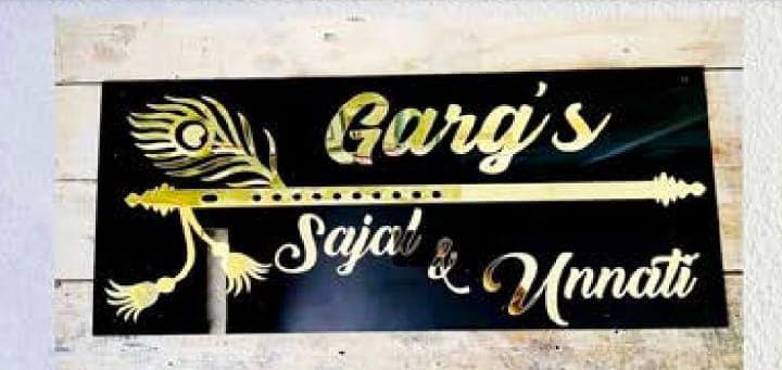 Laser-cut peacock feather nameplate by SV Gifts & Photo Lab