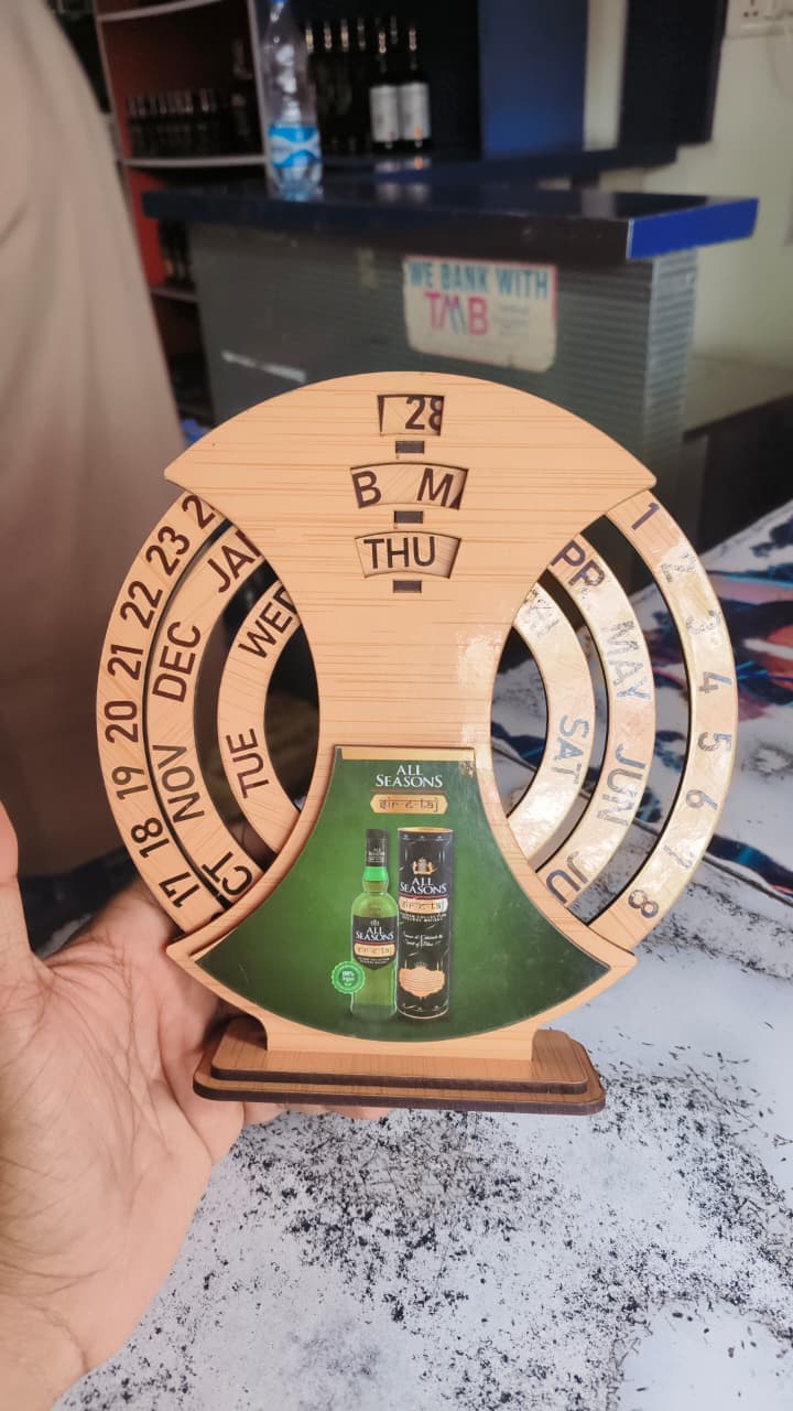 Branded laser-cut wooden calendar for a corporate client, by SV Gifts & Photo Lab
